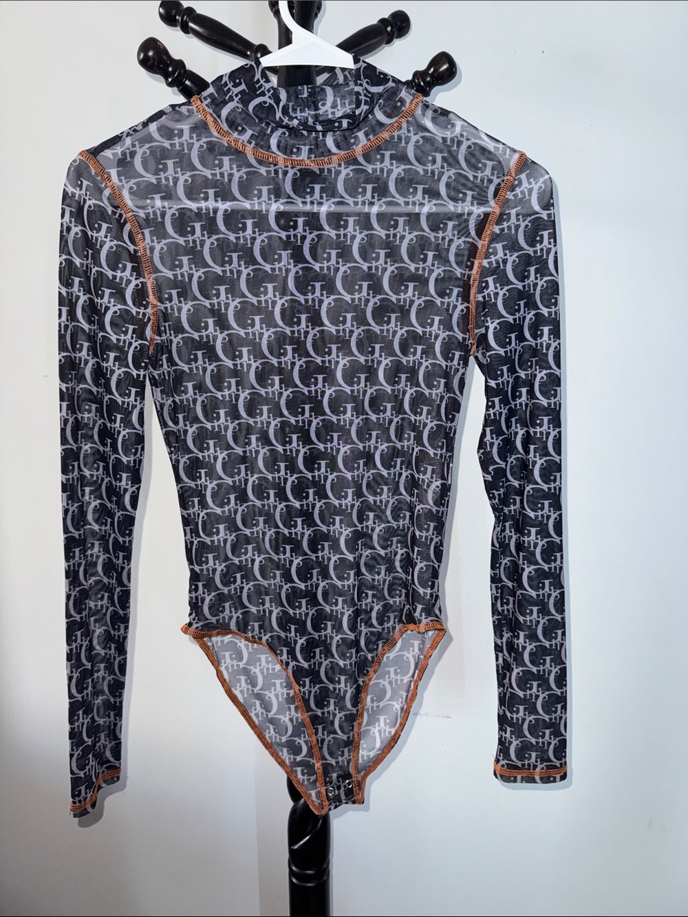 Long-Sleeve Sheer Gray Monogram One-Piece Bodysuit with Orange Trim 26.T